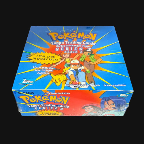 A boxed box of Pokémon Topps Trading Cards Series 2 TV Animation Edition, featuring colorful character artwork on the front and side panels against a plain white background.